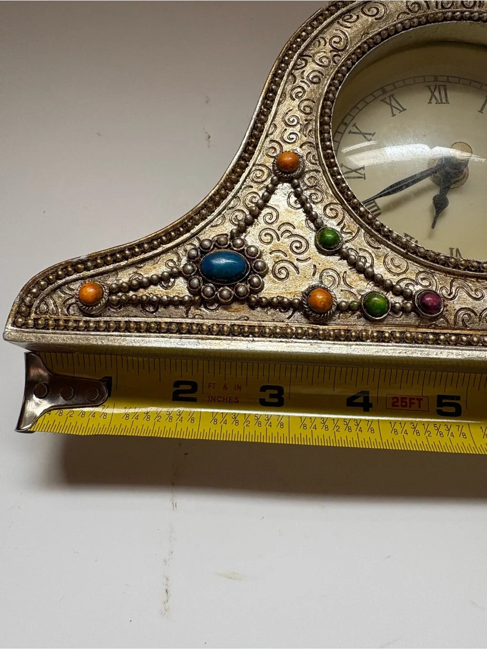 Ornate Silver-Tone Mantel Clock with Multicolor Accents